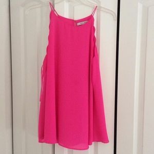 Hot pink top with scalloped edges